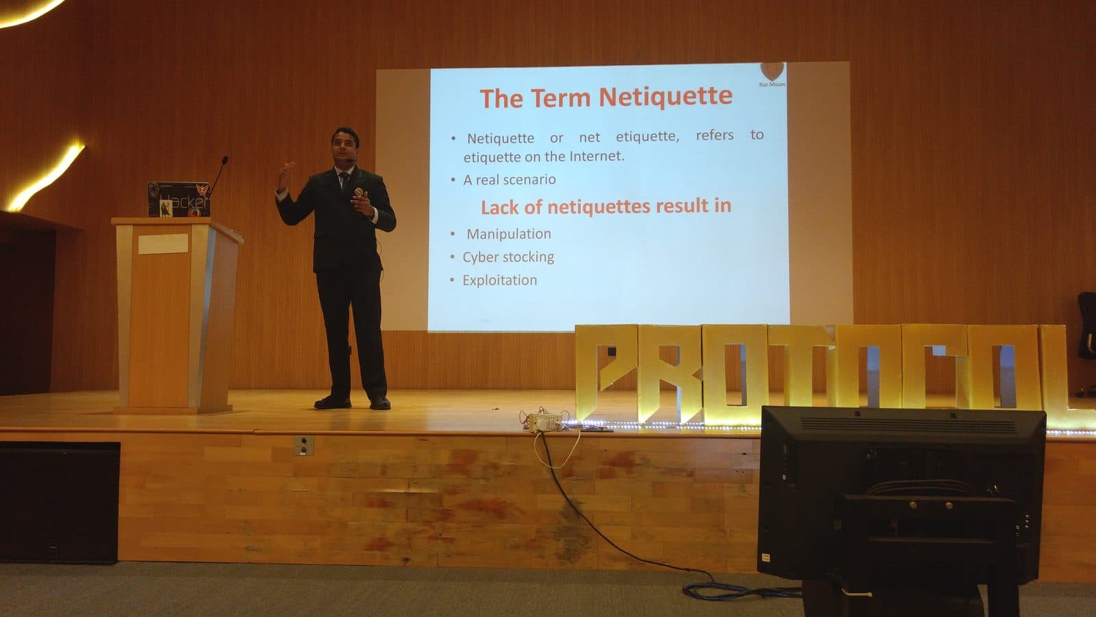 Protocol conference, Mumbai, March 2017 — an early awareness talk on netiquette, delivered with a sticker-covered laptop on the lectern.